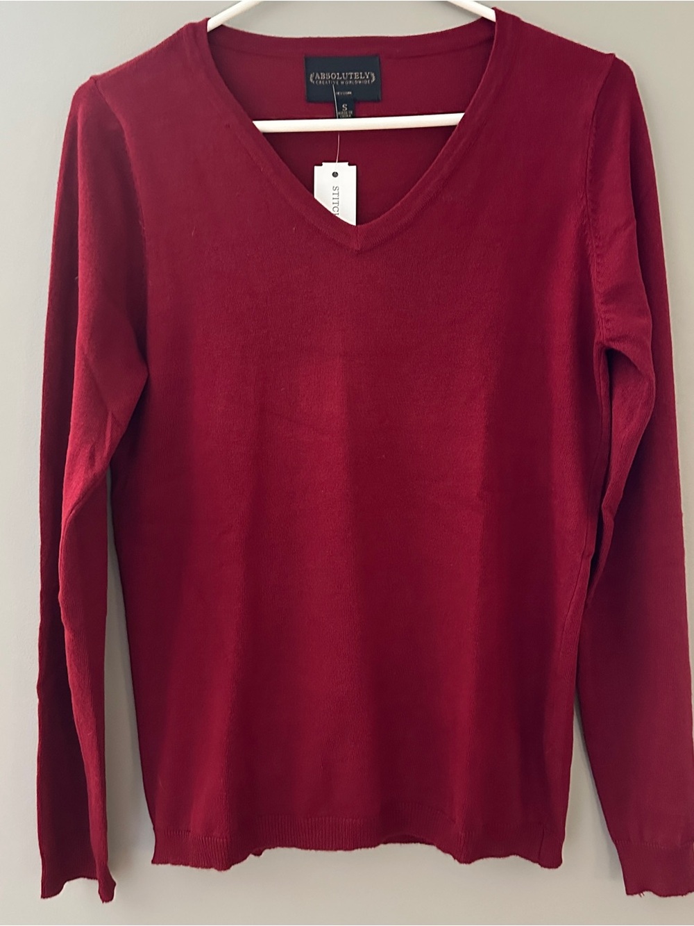Absolutely Creative Worldwide Women's V-Neck Sweater in Wine Red